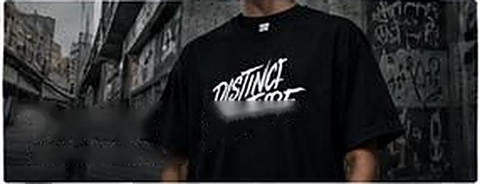 Model wearing a Distinct Kulture t-shirt
